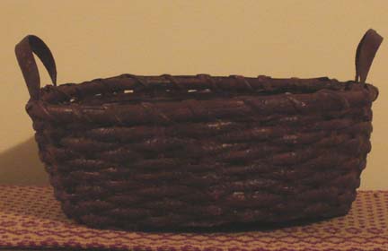 Large burgundy prim round basket-